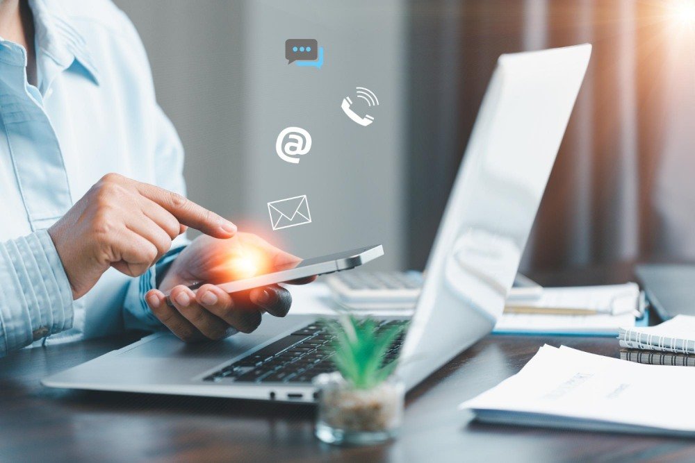Businesswoman using phone and touching